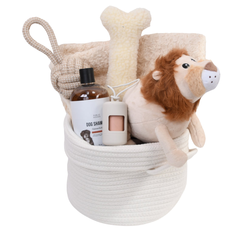 stuffed lion toy and a dog shampoo in a basket