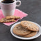 a plate of cookies and a cup of coffee