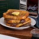 plate of french toast with butter and chocolate spread