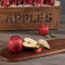 apples on wooden board 