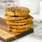 stack of cookies on a wood board