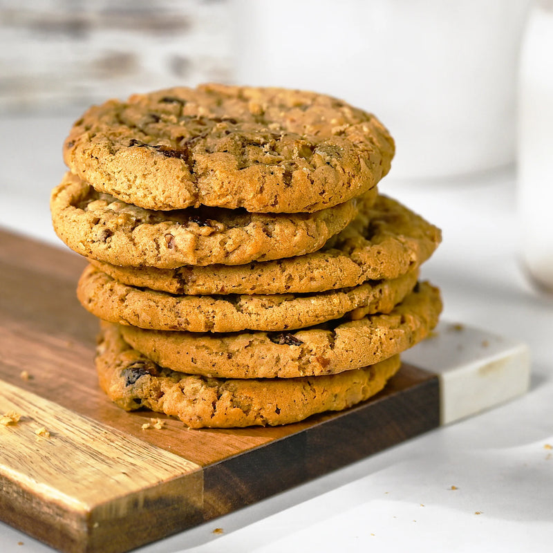 stack of cookies on a wood board