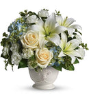 a white and blue flower arrangement