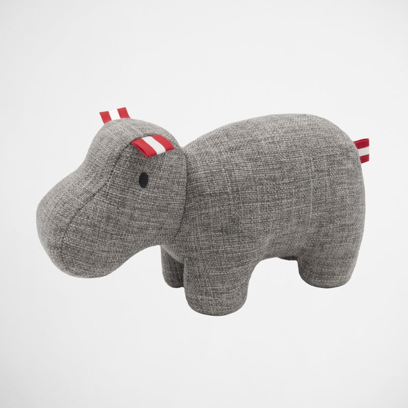 grey stuffed animal with red and white stripes