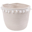 white basket with pom poms