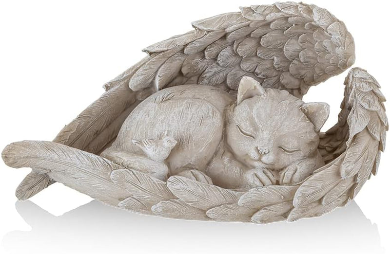 statue of a cat sleeping in a wings