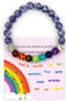 bracelet with colorful beads and a paw print