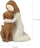 statue of a person hugging a dog with measurements