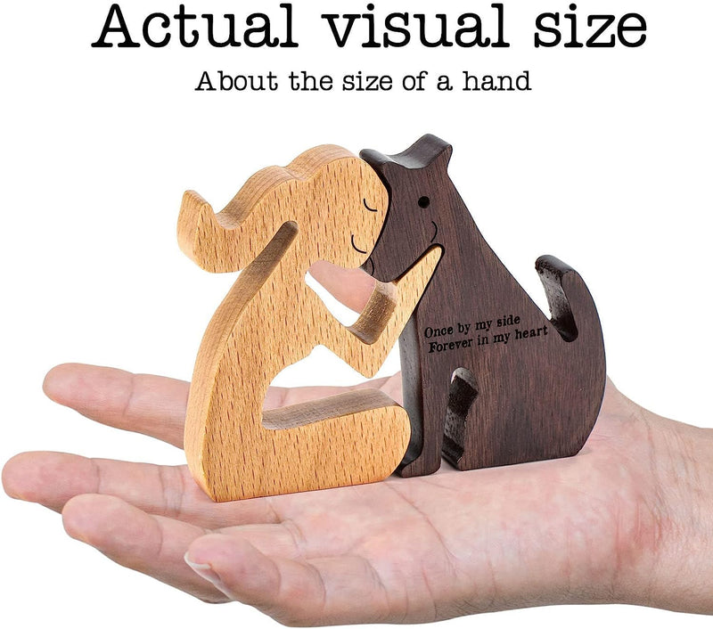 hand holding a wooden figurine